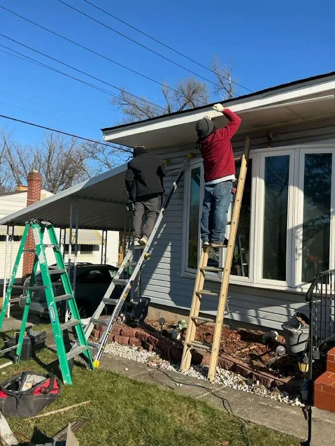 Restoration crew performing exterior repair in Glenn Dale