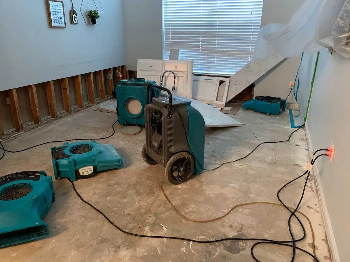 Dehumidifier in flood-cut room for Water Damage Restoration in Glenn Dale